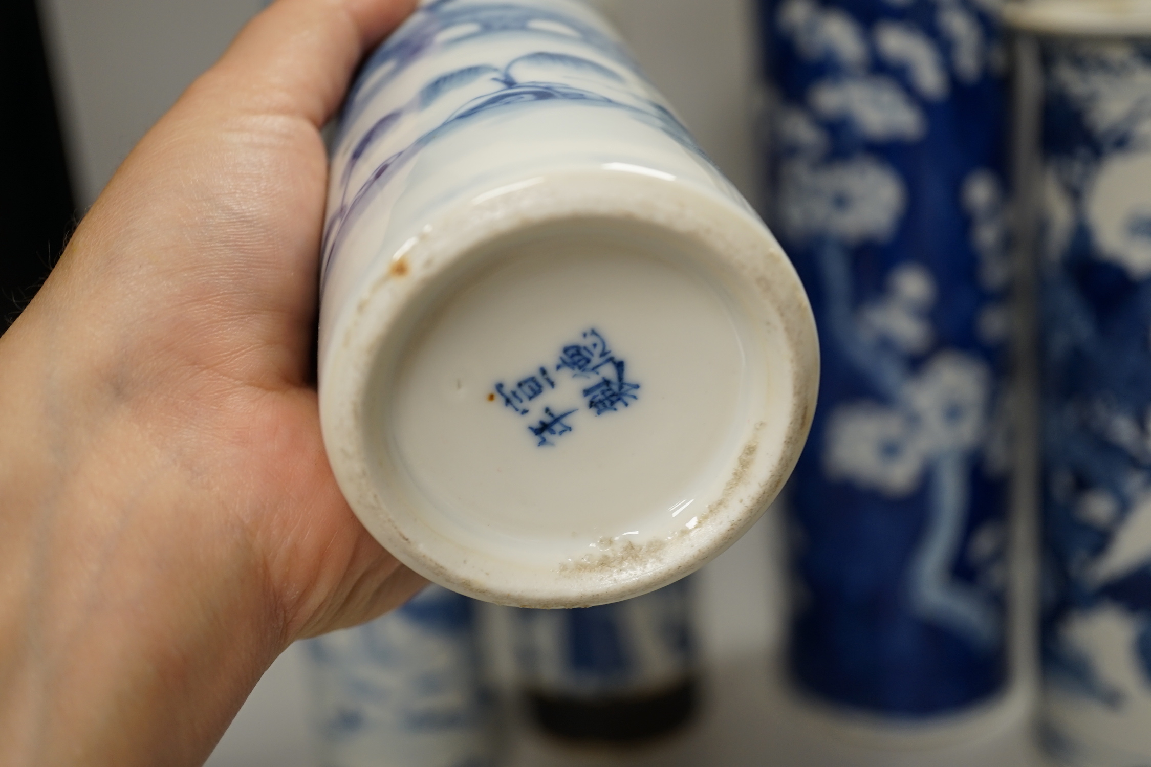 Nine assorted Chinese blue and white cylinder vases, 19th/20th century, tallest 30cm high (a.f.)